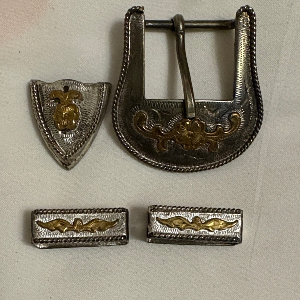 Silver and Gold childβs Belt Buckle Set. Old and tarnished.